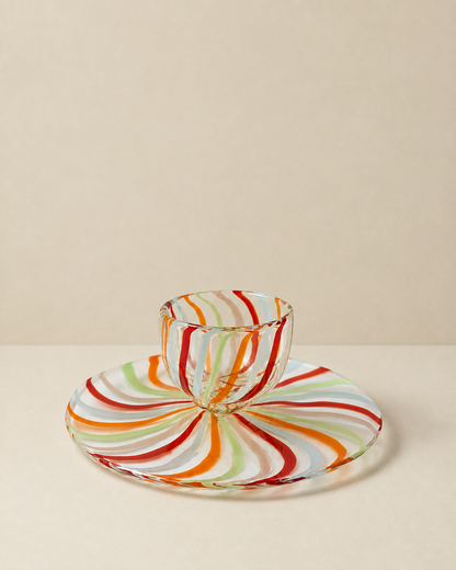 Reversible cake stand flipped over on a cream background